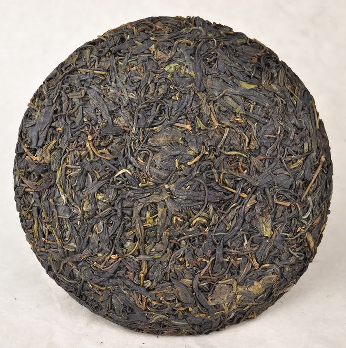 2012 Yunnan Sourcing "Yi Wu Purple Tea" Raw Pu-erh Tea Cake