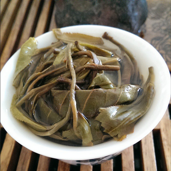 2014 Yunnan Sourcing "Autumn Da Qing Gu Shu" Raw Pu-erh Tea Cake