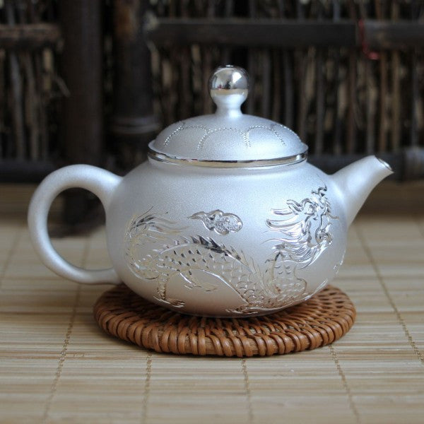 Silver Teapots and Wares