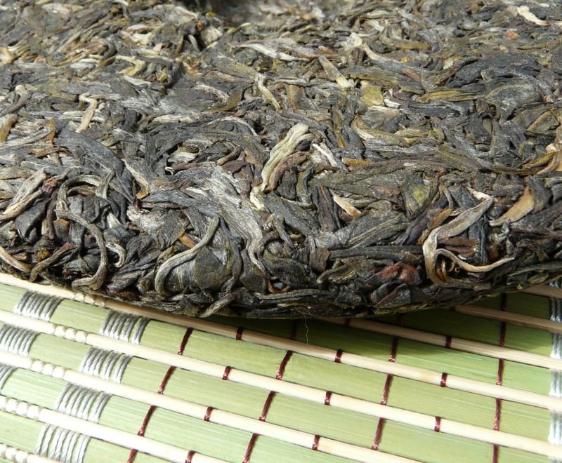 2008 Guan Zi Zai "Stone-Pressed Yi Wu" Wild Arbor tea | Yunnan Sourcing Tea Shop