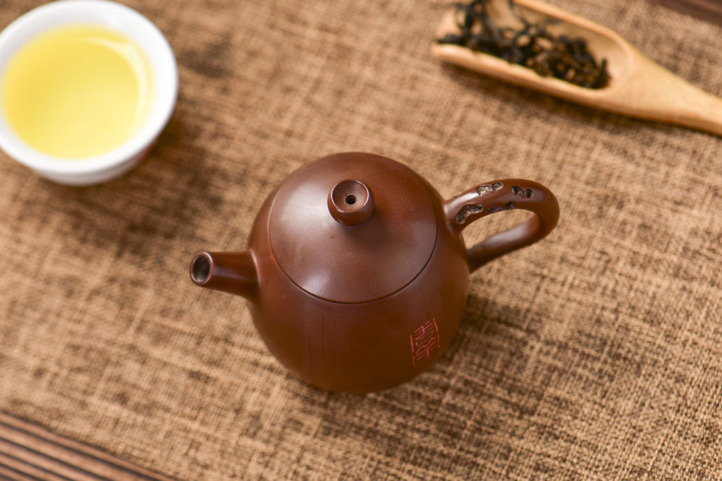 Jian Shui Clay "Plum Branch and Blossom" Dragon Egg Teapot by Zhang Ce