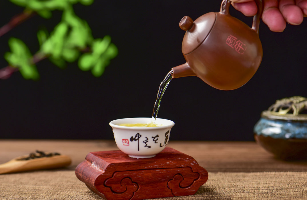 Jian Shui Clay "Plum Branch and Blossom" Dragon Egg Teapot by Zhang Ce