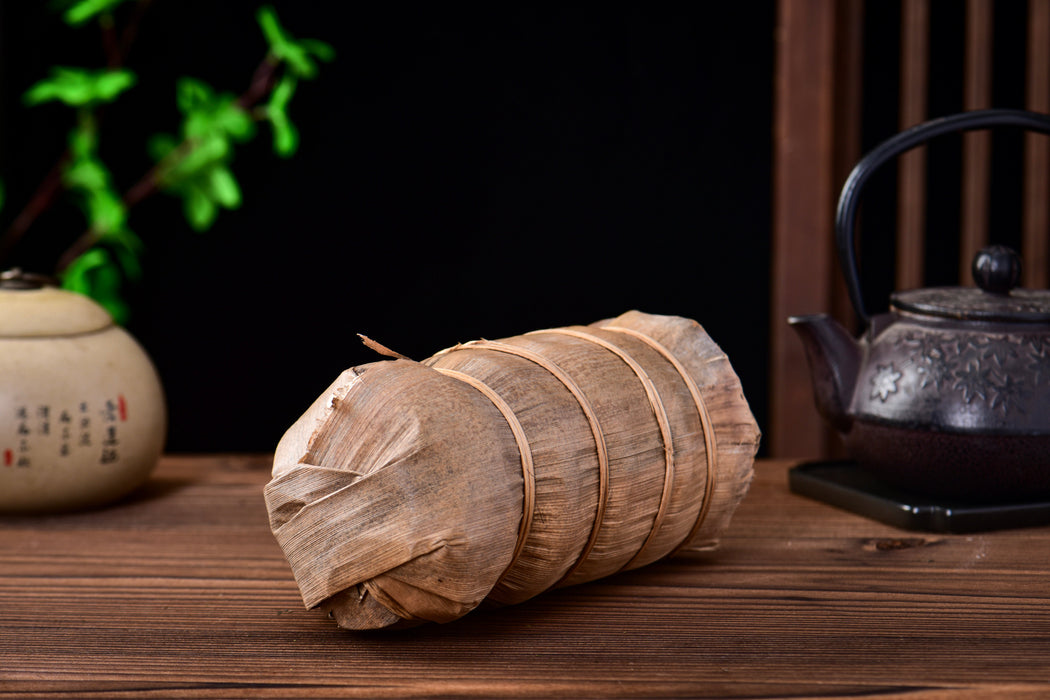 2003 Nan Jian Tu Lin "Bamboo Wrapped" Raw Pu-erh Tea Tuo | Yunnan Sourcing Tea Shop