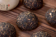 2003 Nan Jian Tu Lin "Bamboo Wrapped" Raw Pu-erh Tea Tuo | Yunnan Sourcing Tea Shop