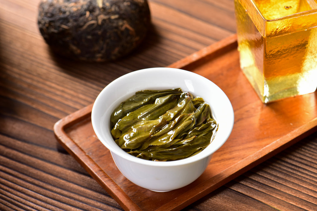 2003 Nan Jian Tu Lin "Bamboo Wrapped" Raw Pu-erh Tea Tuo | Yunnan Sourcing Tea Shop