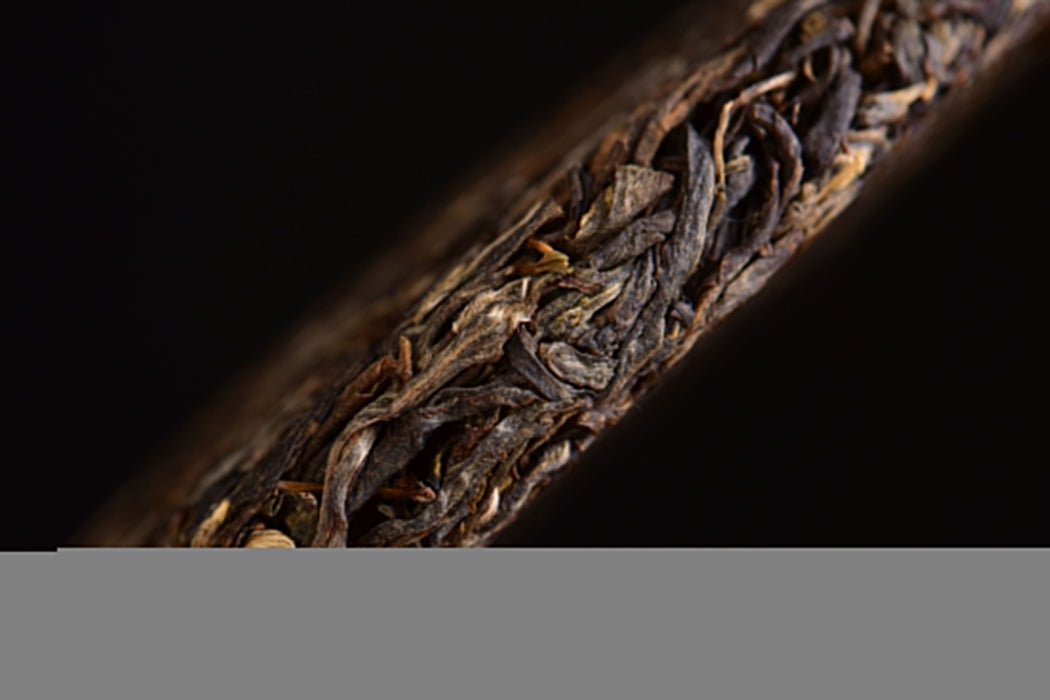 2014 Yun He Zhen "Wu Liang Ancient Rhyme" Raw Pu-erh Tea Cake | Yunnan Sourcing Tea Shop