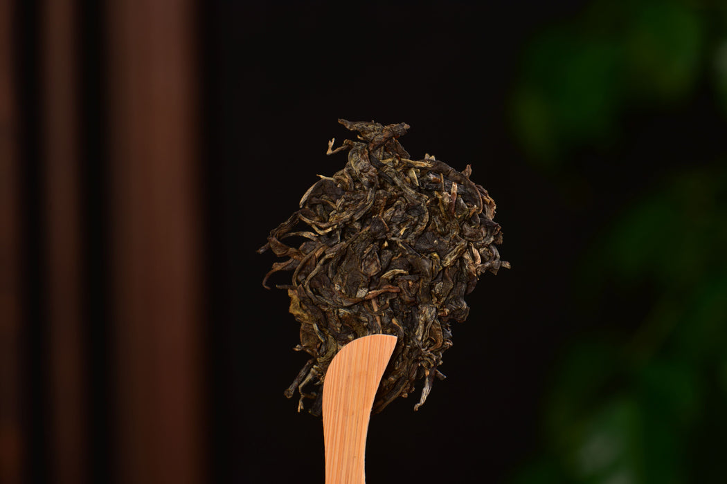 2014 Yun He Zhen "Wu Liang Ancient Rhyme" Raw Pu-erh Tea Cake | Yunnan Sourcing Tea Shop