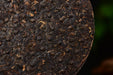2003 CNNP "Red Mark" Raw Pu-erh Tea Iron Cake | Yunnan Sourcing Tea Shop