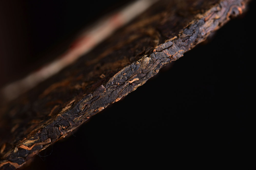 2003 CNNP "Red Mark" Raw Pu-erh Tea Iron Cake | Yunnan Sourcing Tea Shop