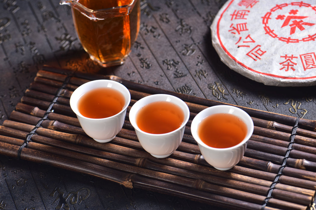 2003 CNNP "Red Mark" Raw Pu-erh Tea Iron Cake | Yunnan Sourcing Tea Shop