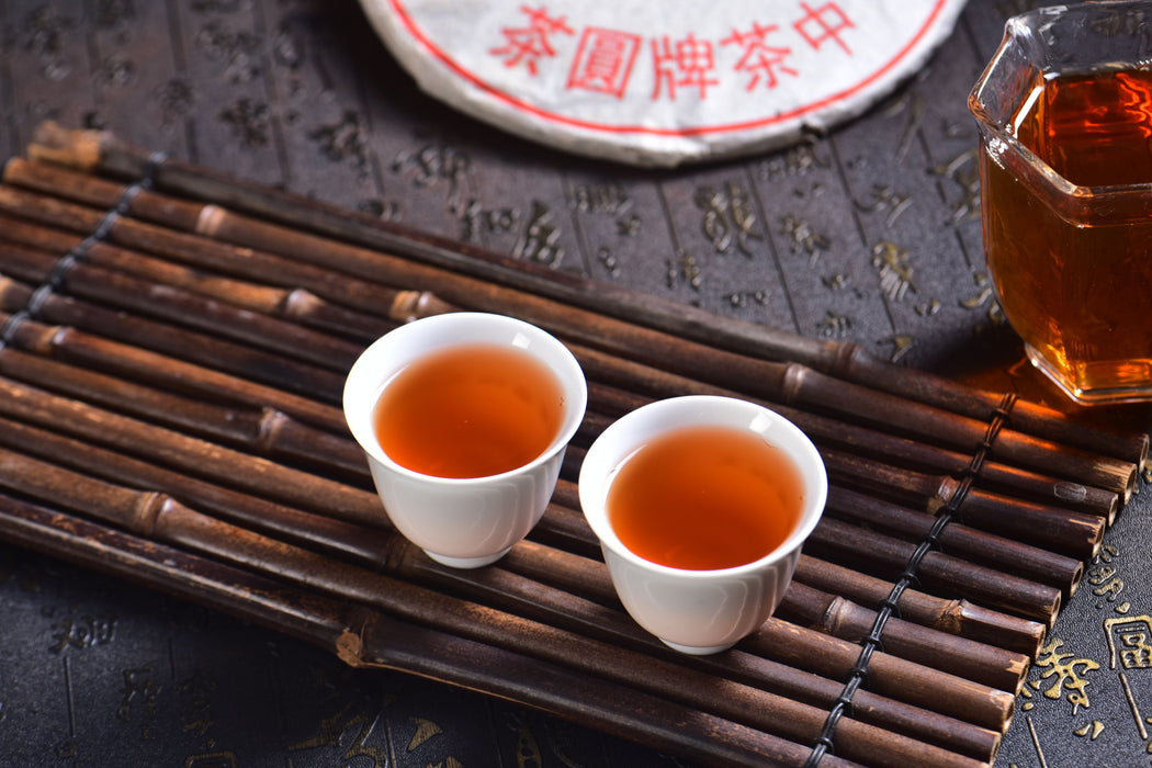 2003 CNNP "Red Mark" Raw Pu-erh Tea Iron Cake | Yunnan Sourcing Tea Shop