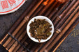 2003 CNNP "Red Mark" Raw Pu-erh Tea Iron Cake | Yunnan Sourcing Tea Shop