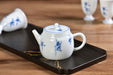 Blue Orchid Pedestal Jingdezhen Porcelain Teapot and Cups Set | Yunnan Sourcing Tea Shop