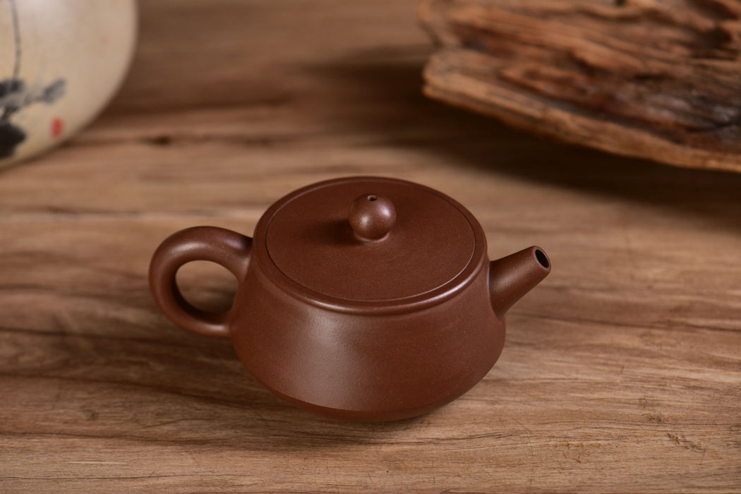Wenge Ni "Flat Round" Yixing Teapot by Jin Jia Qi | Yunnan Sourcing Tea Shop