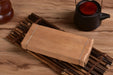 2009 Jinggu "Bamboo-Wrapped Long Brick" Ripe Pu-erh Tea | Yunnan Sourcing Tea Shop