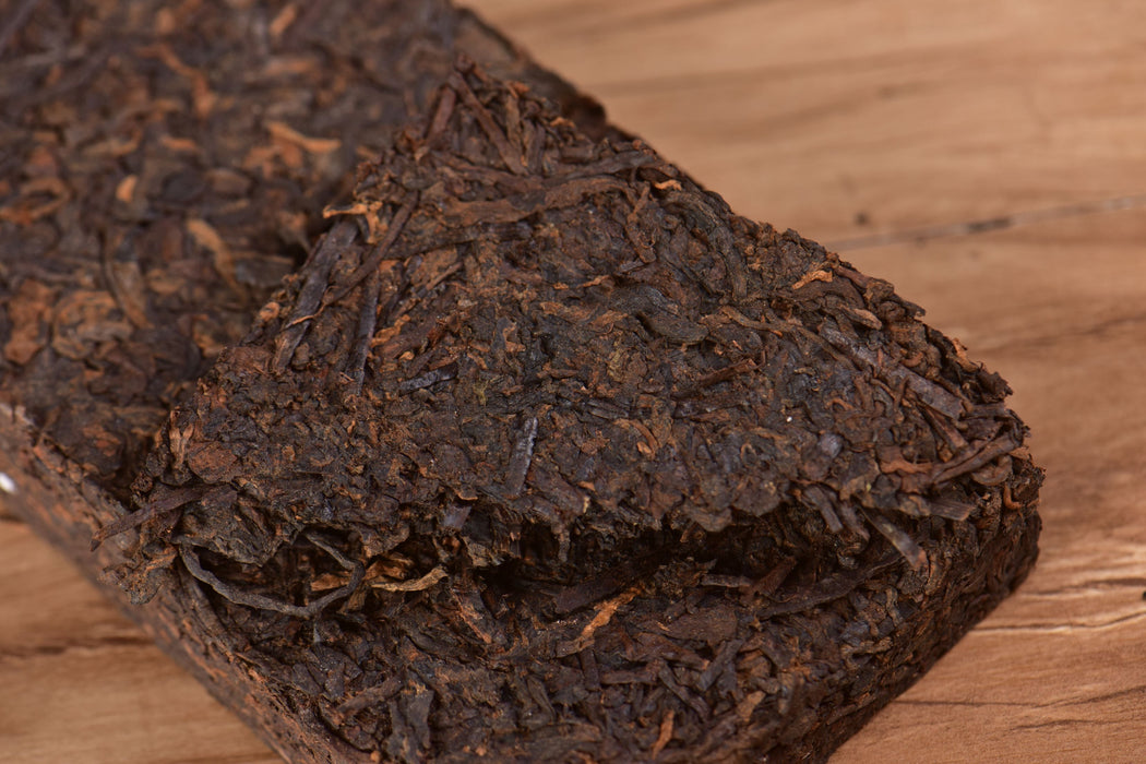 2009 Jinggu "Bamboo-Wrapped Long Brick" Ripe Pu-erh Tea | Yunnan Sourcing Tea Shop