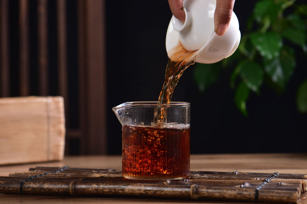 2009 Jinggu "Bamboo-Wrapped Long Brick" Ripe Pu-erh Tea | Yunnan Sourcing Tea Shop