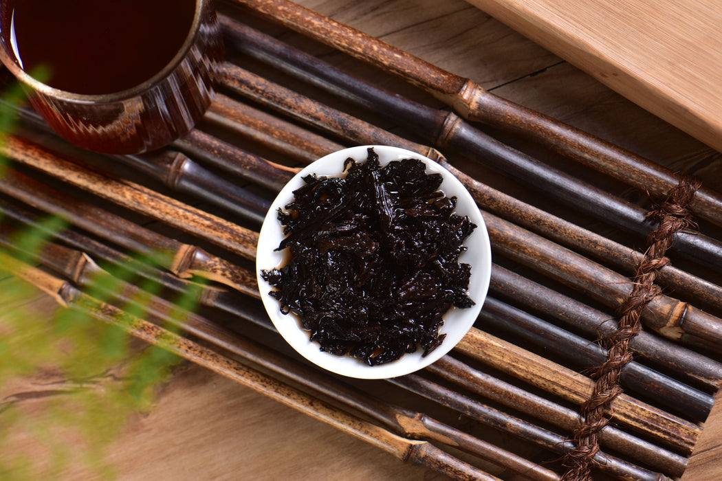 2009 Jinggu "Bamboo-Wrapped Long Brick" Ripe Pu-erh Tea | Yunnan Sourcing Tea Shop