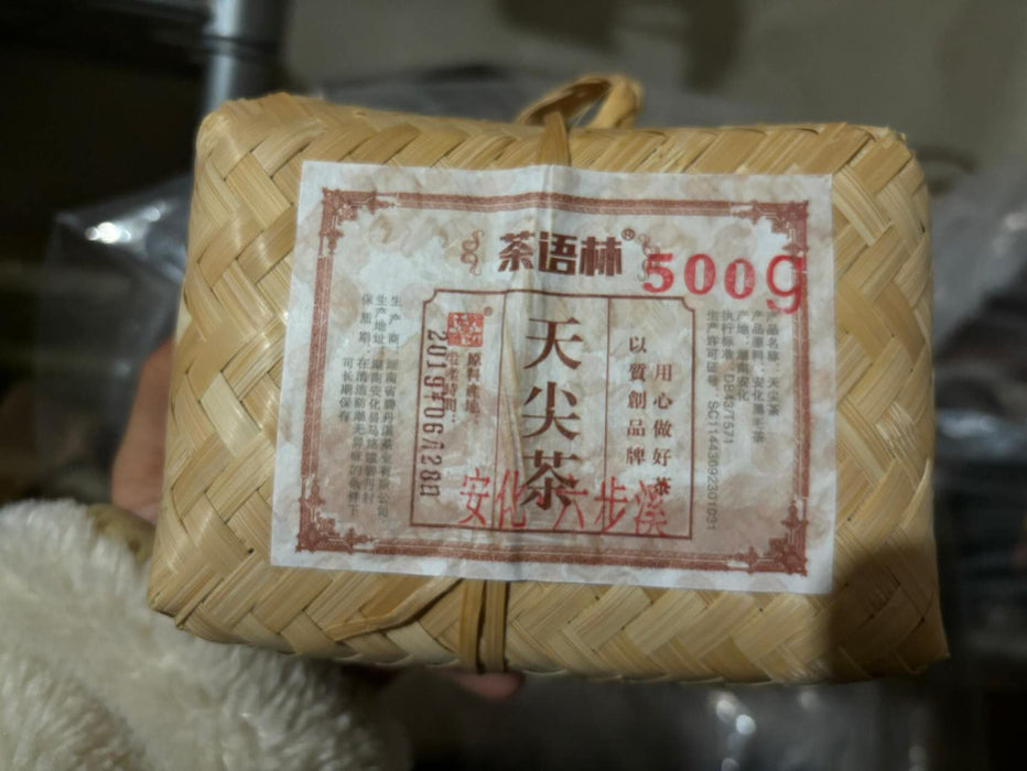 Woven basket with a label on a blurred background