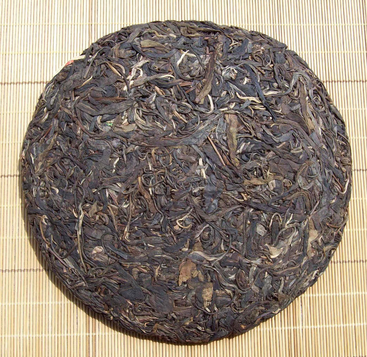2005 Yong Pin Hao "Bamboo House" Raw Pu-erh Tea Cake of Yi Wu Mountain