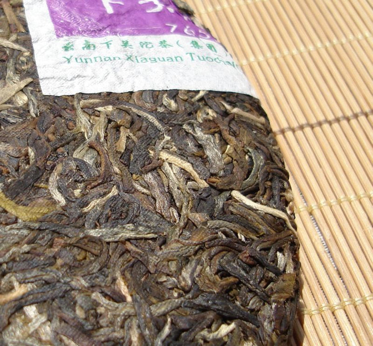 2008 Xiaguan 7653 Yuan Cha Raw Pu-erh Tea Cake | Yunnan Sourcing Tea Shop