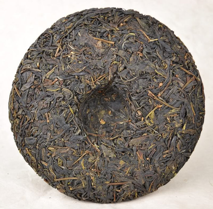 2012 Yunnan Sourcing "Yi Wu Purple Tea" Raw Pu-erh Tea Cake