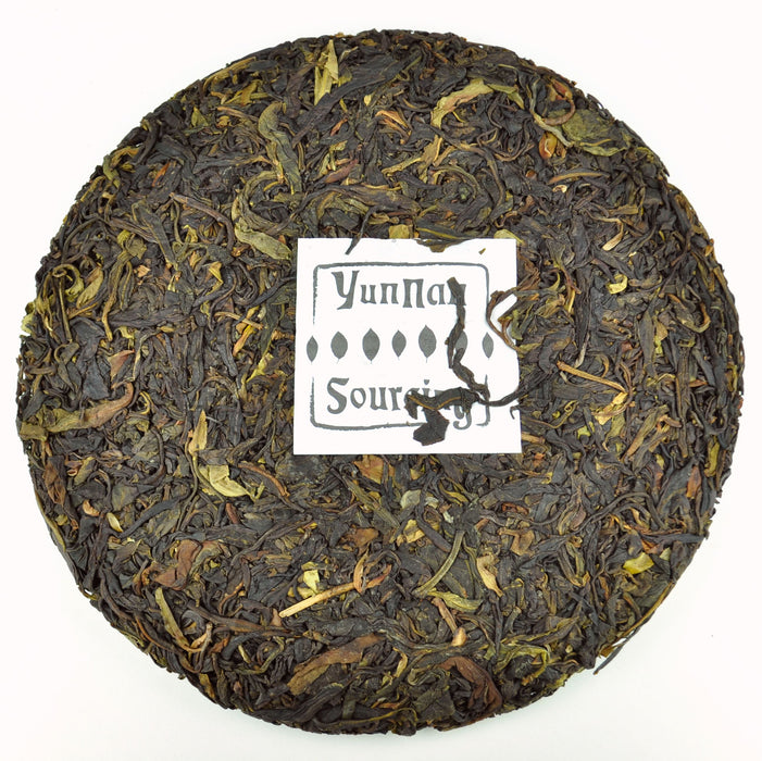 2015 Yunnan Sourcing Dehong Ye Sheng Cha Wild Tree Purple Tea cake