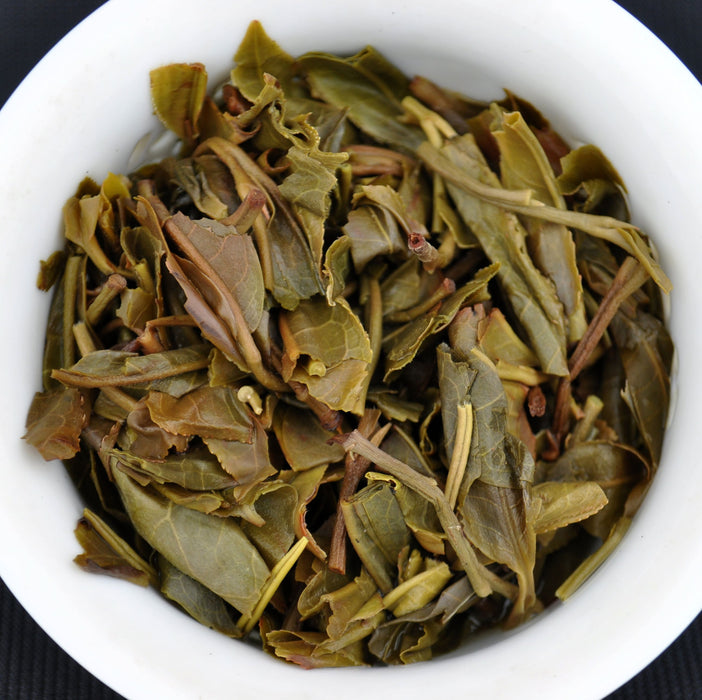 2015 Yunnan Sourcing "Huang Shan Gu Shu" Old Arbor Raw Pu-erh Tea Cake