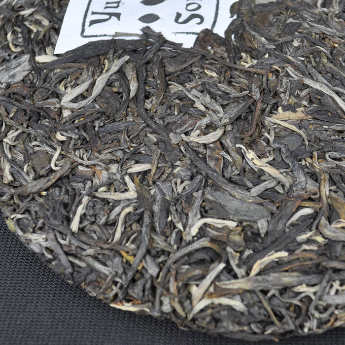 2015 Yunnan Sourcing Qing Mei Shan Old Arbor Pu-erh Tea Cake