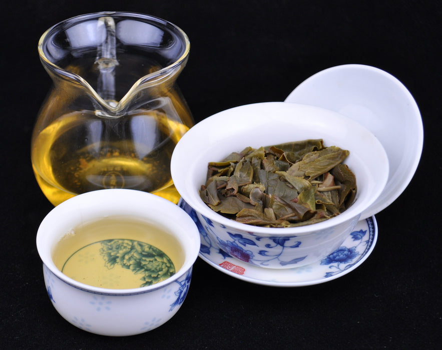 2014 Yunnan Sourcing Jing Gu Old Arbor Raw Pu-erh Tea Cake