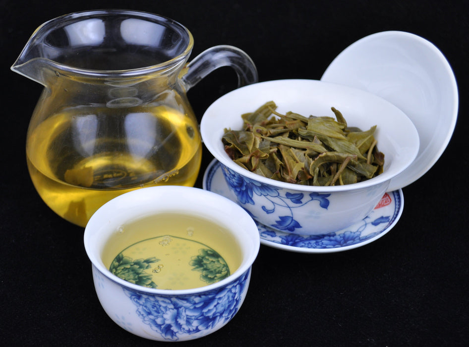 2014 Yunnan Sourcing Xiao Hu Sai Village Raw Pu-erh Tea Cake