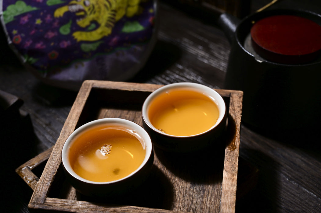 2022 Yunnan Sourcing "Man Gang Gu Shu" Black Tea and White Tea Cake