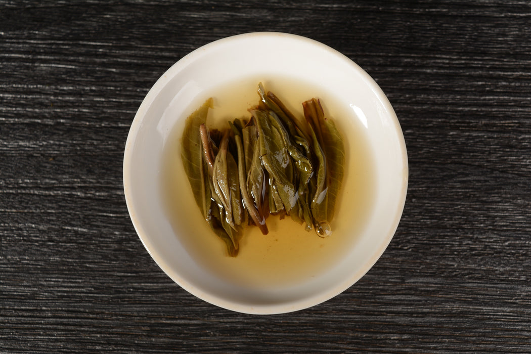 2019 Yunnan Sourcing "Xiang Chun Lin" Yi Wu Old Arbor Raw Pu-erh Tea Cake