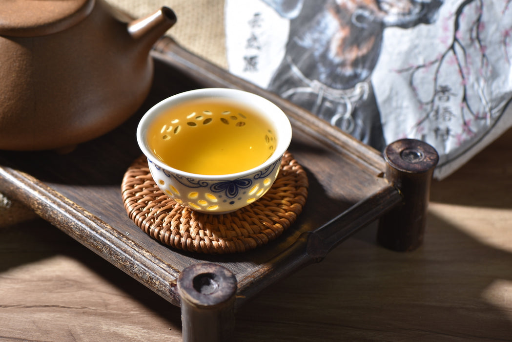 2018 Yunnan Sourcing "Xiang Chun Lin" Yi Wu Old Arbor Raw Pu-erh Tea Cake