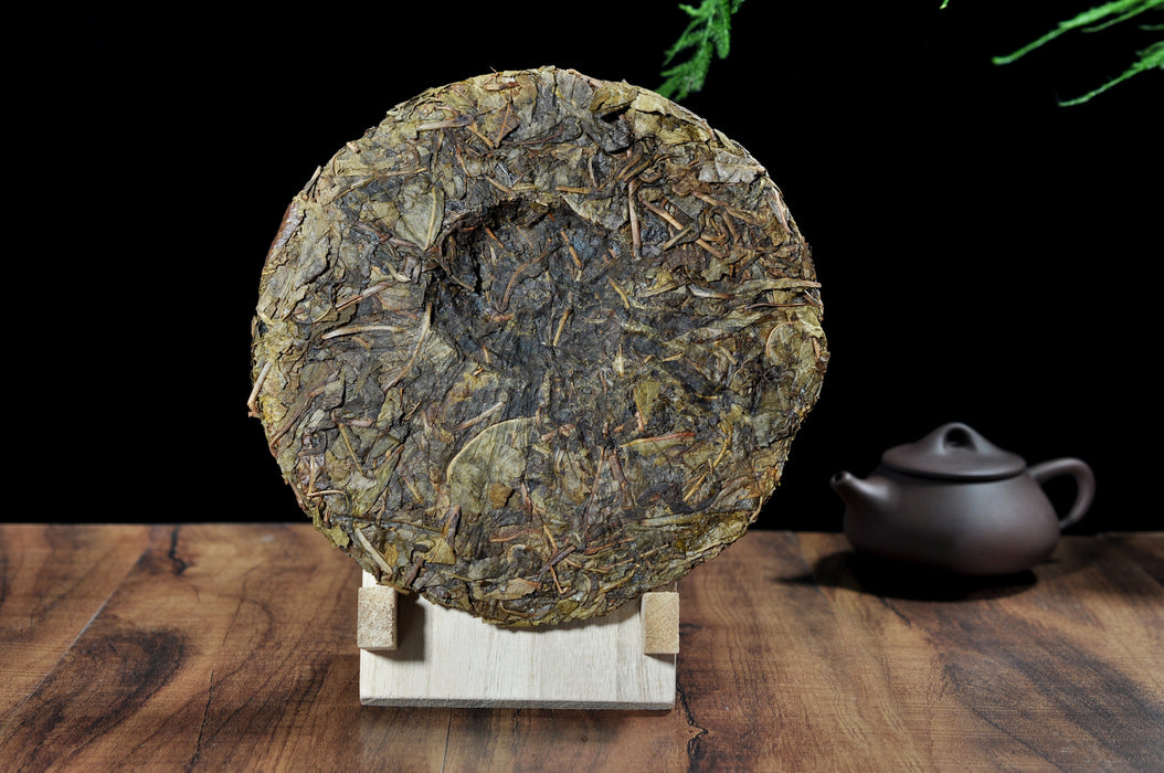 2000 Yi Wu "Huang Pian" Matured Leaves Raw Pu-erh Tea Cake