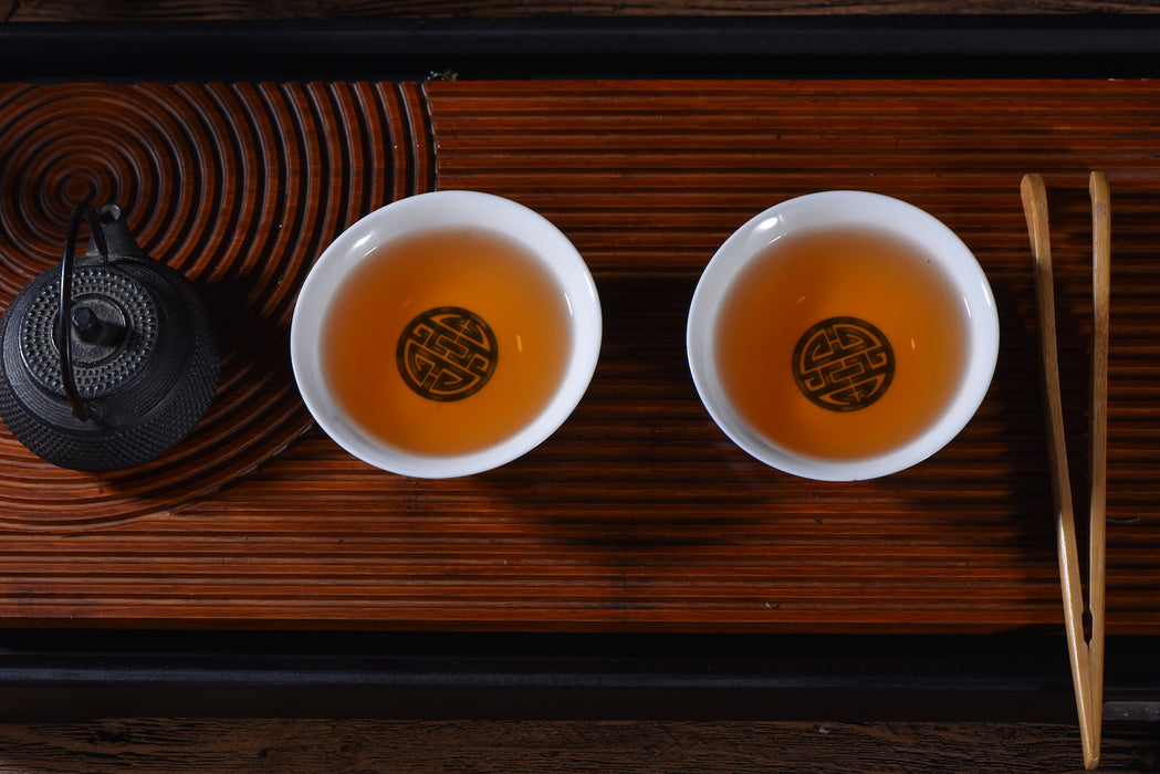 2008 Yi Wu Zheng Shan "Tong Xing Lao Zi Hao" Raw Pu-erh Tea Cake - Yunnan Sourcing Tea Shop